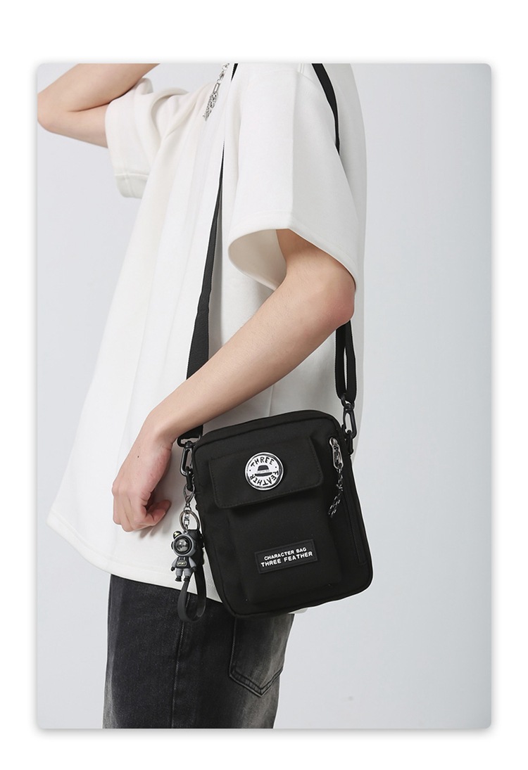 潮酷港風(fēng)休閑男運(yùn)動(dòng)手機(jī)小包2023新款唐妮兒學(xué)生女機(jī)車單肩斜挎包